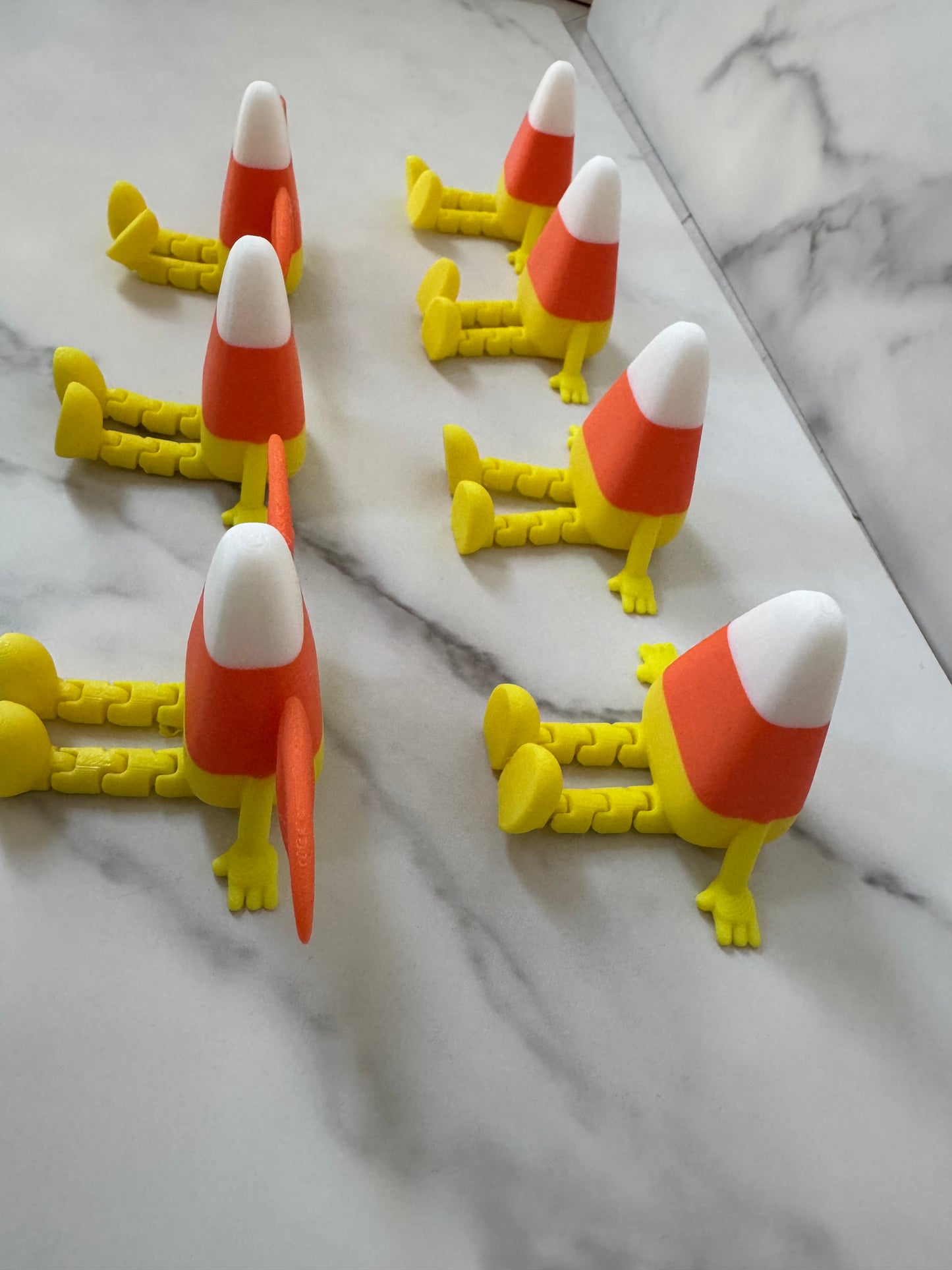 Articulated/flexible candy corn