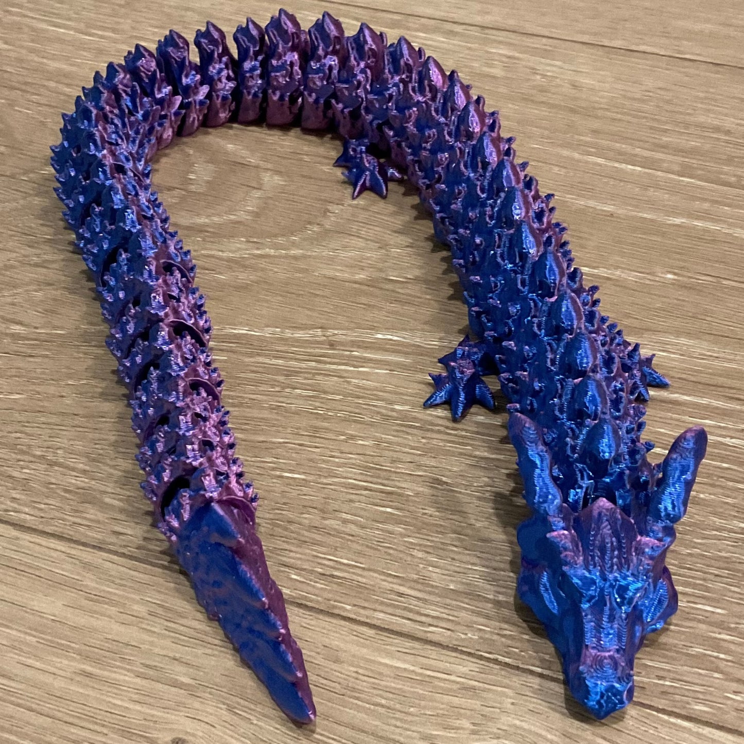 shiny articulated dragon