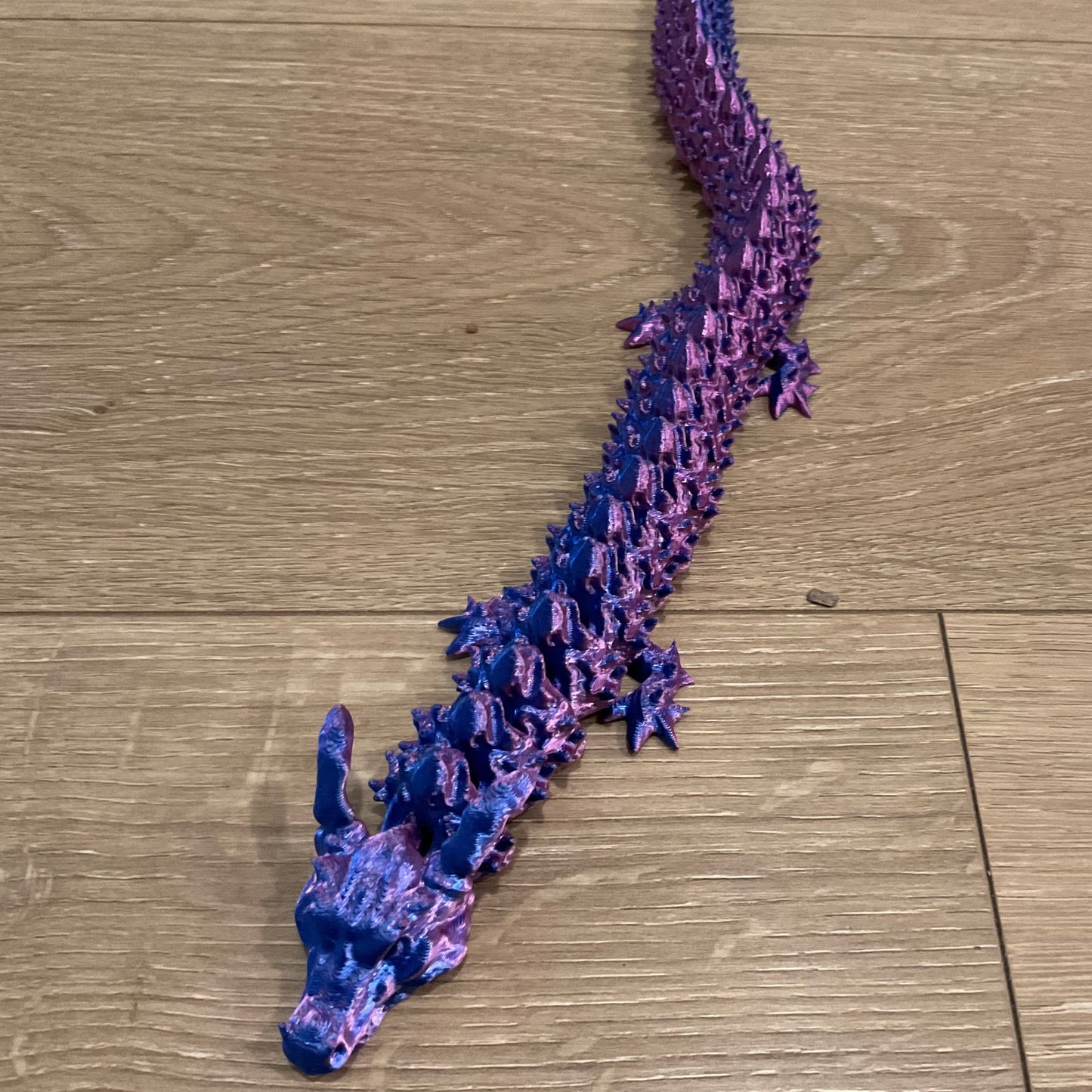 shiny articulated dragon